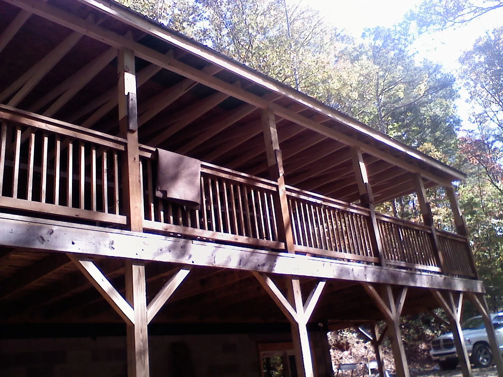 Timber framing under a new elevated porch and deck — Roof Leak Repair in Joshua by Roofing Brothers